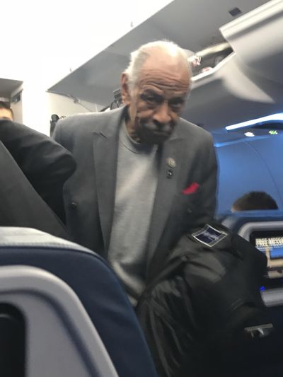In this photo provided by Dennis Lennox, Democratic Rep. John Conyers, the longest serving member of the House, is seen on a plane to Detroit on Tuesday, Nov. 28, 2017. Conyers missed two roll call votes in the House Tuesday night and was photographed by a passenger boarding a Delta Airlines flight to Detroit. Conyers is accused of sexual misconduct by a former staffer. (Associated Press)