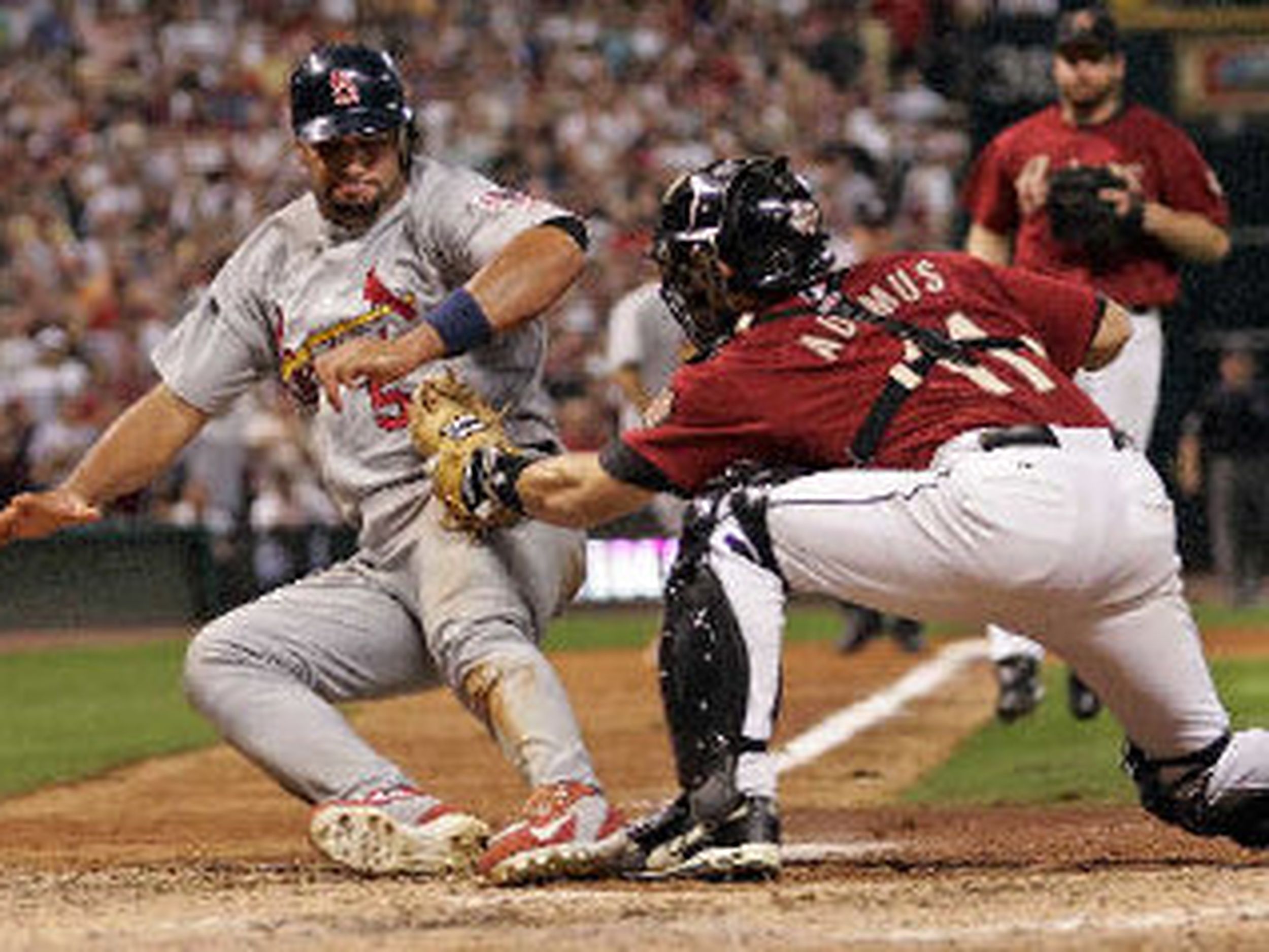 Houston Astros First baseman Lance Berkman (17) loses the grip on