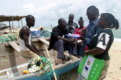 
 Census workers take data of an unidentified fishermen in Apese village in Lagos, Nigeria, on Monday. 
 (Associated Press / The Spokesman-Review)