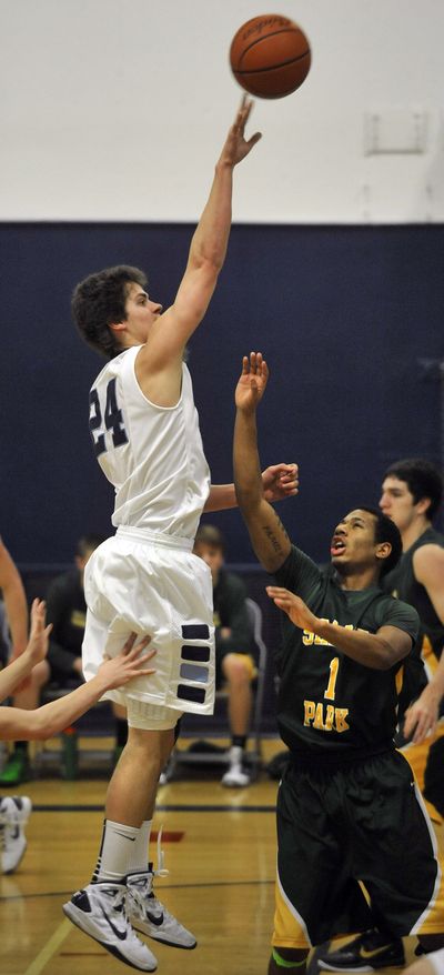 Gonzaga Prep’s Chris Sarbaugh puts up a shot against Shadle Park. (Dan Pelle)