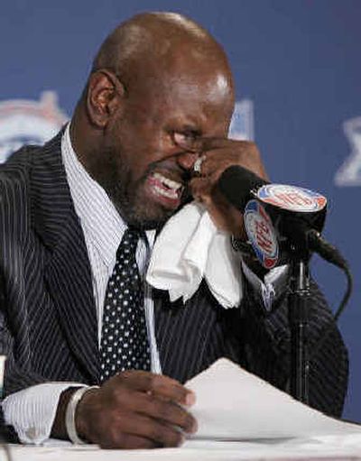 
 Emmitt Smith, league MVP in 1993, wipes his eyes during a news conference Thursday.
 (Associated Press / The Spokesman-Review)