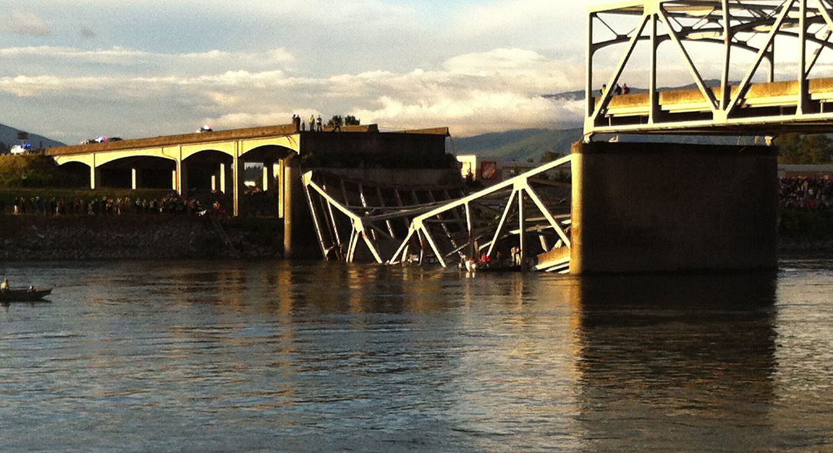 People look on after the Interstate 5 bridge collapsed over the Skagit River in Mount Vernon, Wash., Thursday, May 23, 2013. (Rick Lund / The Seattle Times)