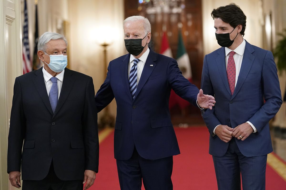 President Joe Biden walks with Mexican President Andrés Manuel López Obrador and Canadian Prime Minister Justin Trudeau during a meeting in the East Room of the White House in Washington, Thursday, Nov. 18, 2021.  (Susan Walsh)