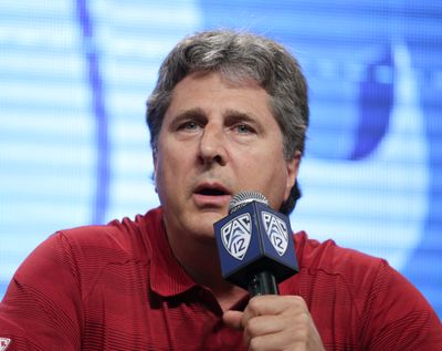 Washington State football coach Mike Leach talks to the media during the Pac-12 media day on Friday in Culver City, Calif.  (Associated Press)