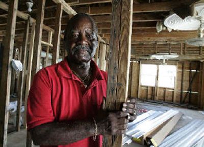 
Aloyd Edinburgh, 75, of New Orleans takes a break from working on his home to talk to The Associated Press about his experience with his insurance company in aftermath of Hurricane Katrina.  
 (Associated Press / The Spokesman-Review)