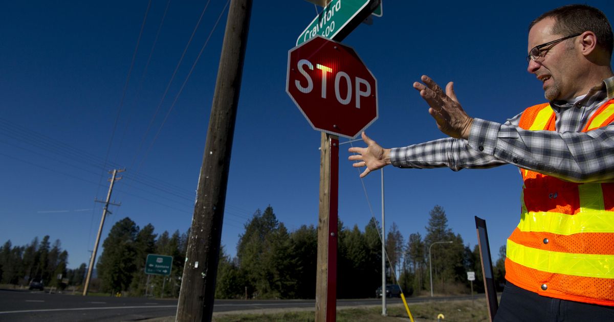 New signs at dangerous intersections warn motorists of cross traffic on