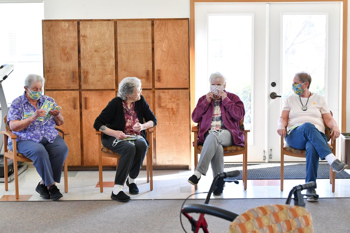 From left, residents of Cheney Care Community Center: Dorothy Hilyard, 78, Bonnie Brady, 79, Betty Jones, 81, and Melinda Richards, 68, off some of the masks they