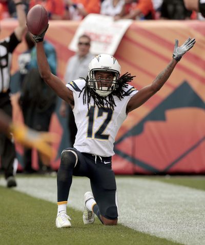 San Diego Chargers wide receiver Travis Benjamin celebrates his touchdown catch against the Denver Broncos during the second half of an NFL football game, Sunday, Oct. 30, 2016, in Denver. (Joe Mahoney / Associated Press)