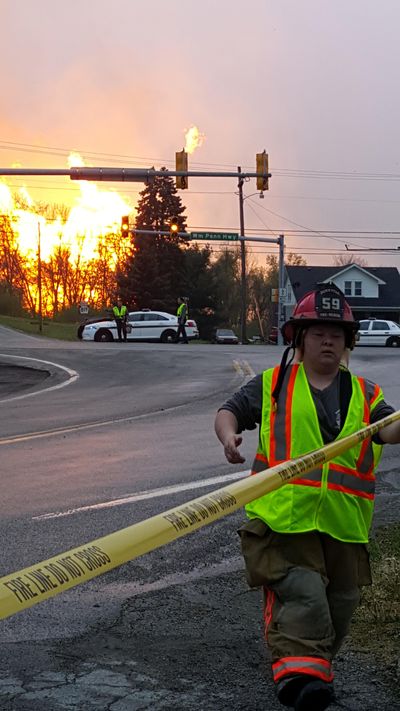 In this photo taken by Salem Township Supervisor Kerry Jobe, first responders work the scene during a natural gas explosion at a nearby pipeline complex in Greensburg, Pa., Friday. (Kerry Jobe / Associated Press)