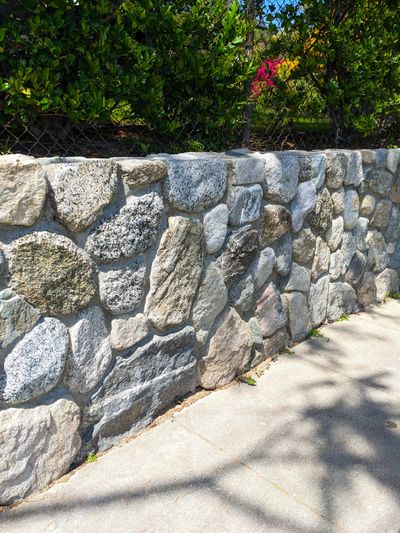 This retaining wall was rebuilt by recycling all the original stone. The original wall stood for over 110 years.  (Tribune Content Agency)