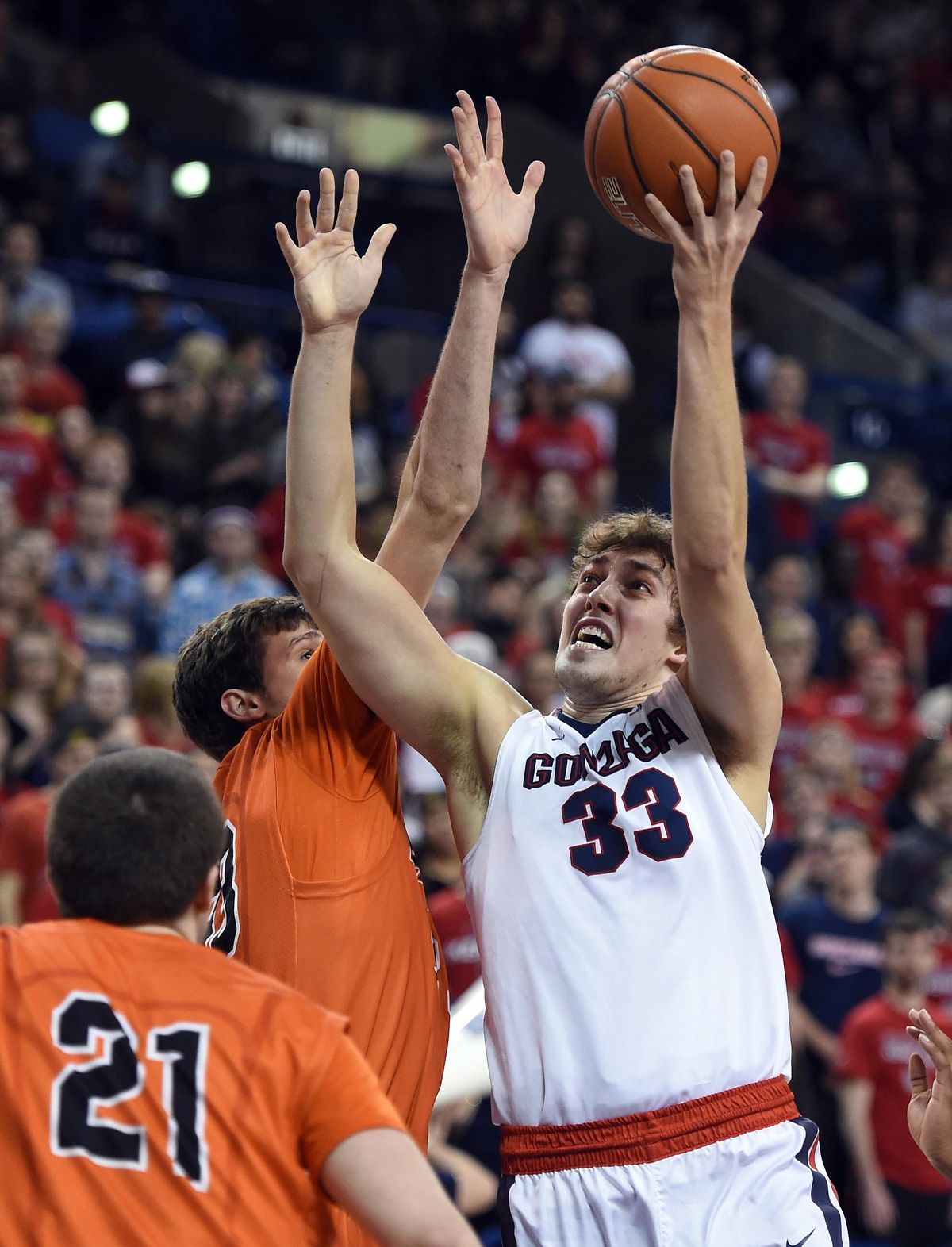 Gonzaga forward Kyle Wiltjer shoots the ball over Pacific forward Ilias Theodorou during the first half of a NCAA college basketball game, Feb. 18, 2016, at the McCarthey Athletic Center in Spokane. (Colin Mulvany / The Spokesman-Review)