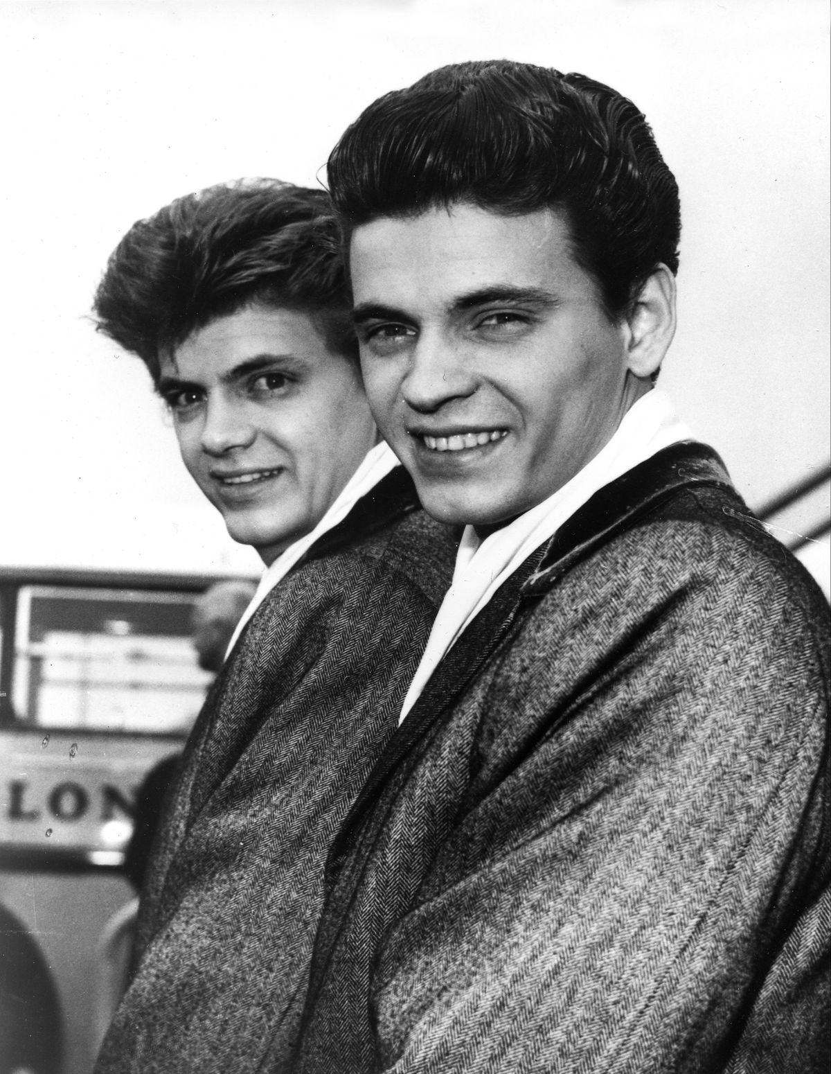In this April 1, 1960 photo, Phil, left, and Don of the Everly Brothers arrive at London Airport from New York to begin their European tour. Don Everly, one-half of the pioneering rock ’n’ roll Everly Brothers whose harmonizing country rock hits impacted a generation of rock music, has died. He was 84. A family official said Everly died at his home in Nashville, Tennessee, on Saturday, Aug. 21, 2021.  (STF)