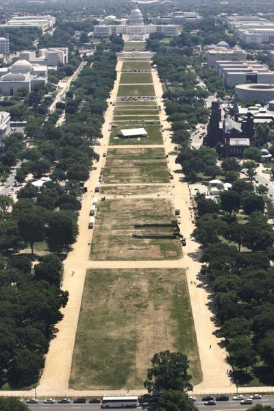 After festivals and celebrations in early July, the National Mall is worn from wear. (Associated Press / The Spokesman-Review)