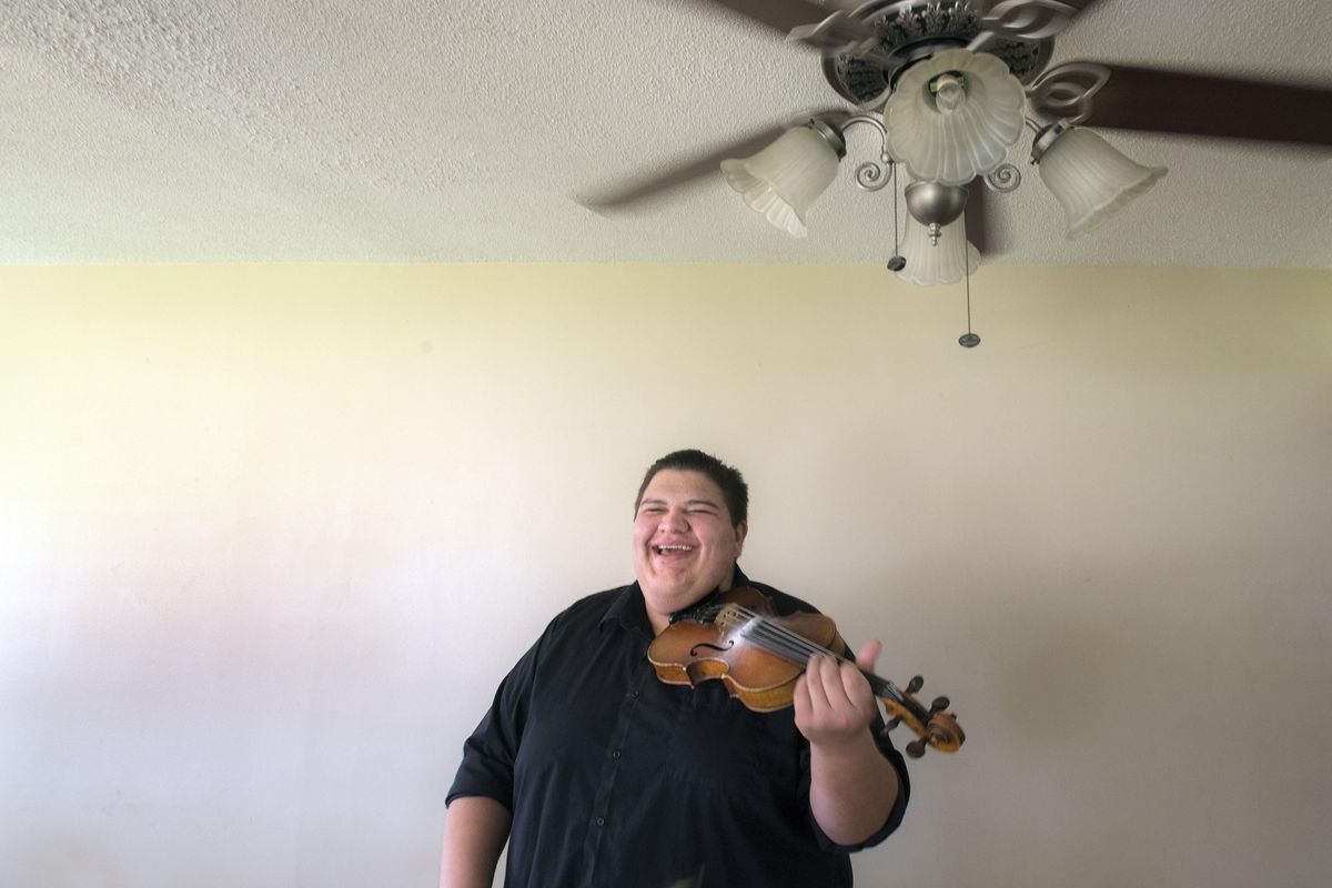 Aaron Castilla is a 21-year-old fiddling and mandolin bluegrass sensation who lives in Spokane Valley. Later this month he leaves for California where he’s landed a gig with a respected touring bluegrass/swing band. This could be a big break. Aaron has world-class chops and the potential of being a major player. (Dan Pelle / The Spokesman-Review)