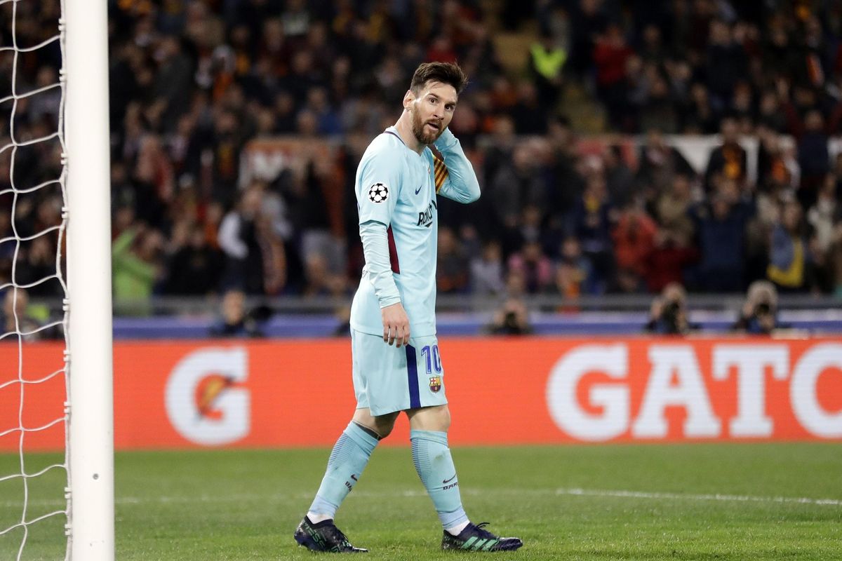 Barcelona’s Lionel Messi reacts after missing a scoring chance during the Champions League quarterfinal second leg soccer match between Roma and FC Barcelona at Rome’s Olympic Stadium, Tuesday, April 10, 2018. Roma won 3-0 and advances to the semifinals. (Andrew Medichini / Associated Press)
