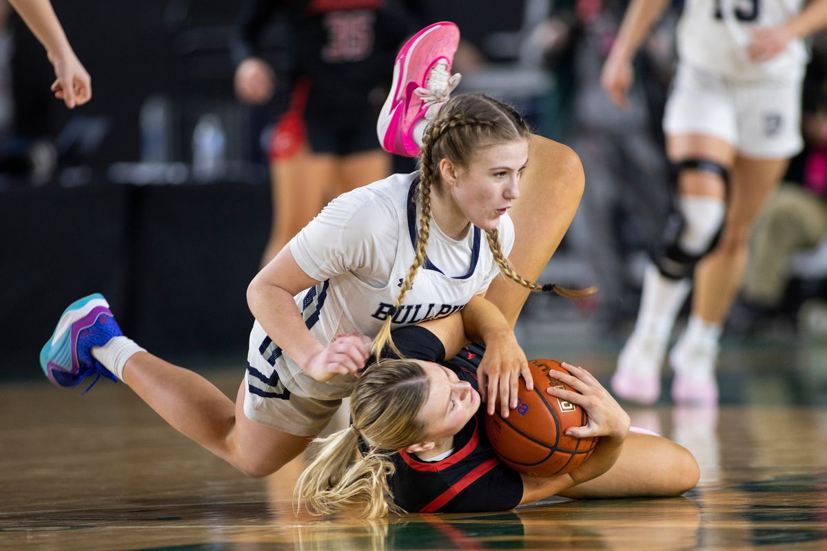 Gonzaga Prep’s Aylah Cornwall, top, gets called for a foul going after a loose ball with Camas’ Riley Sanz during Saturday’s State 4A championship at the Tacoma Dome.  (Patrick Hagerty/For The Spokesman-Review)