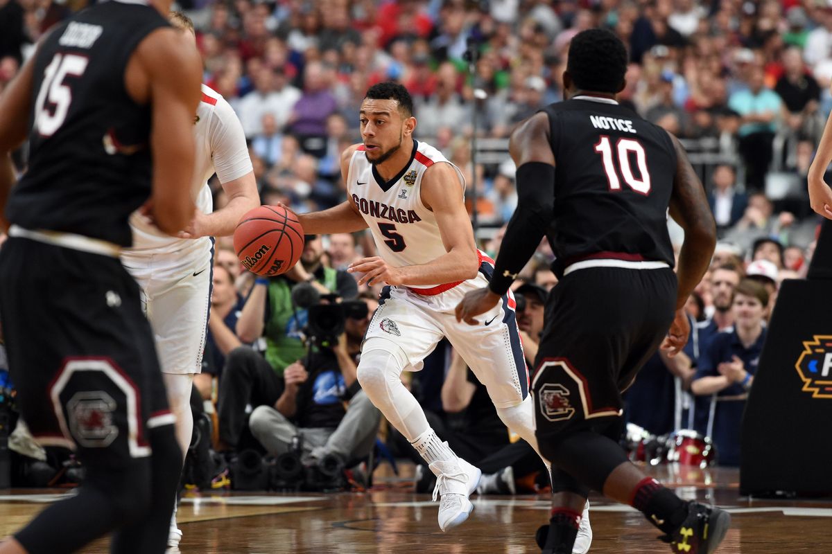 Gonzaga guard Nigel Williams-Goss (5) dribbles the ball downcourt during the first half of an NCAA Final Four basketball game, Sat., April 1, 2017, in Phoenix. (Colin Mulvany / The Spokesman-Review)