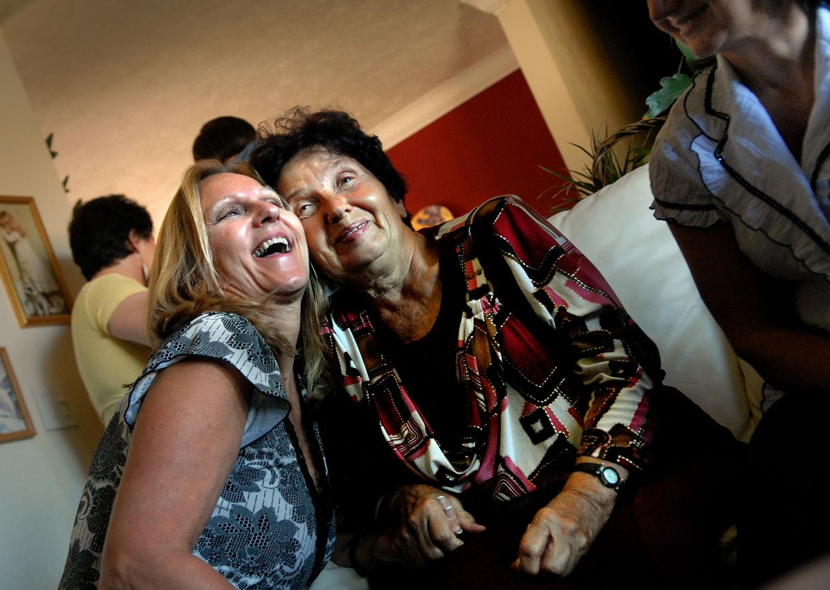 Angie Petticrew, left, shares a moment Sunday in Spokane with her recently found half sister Emma Sokolova, of Kramatorsk, Ukraine.  (Photos by BRIAN PLONKA / The Spokesman-Review)