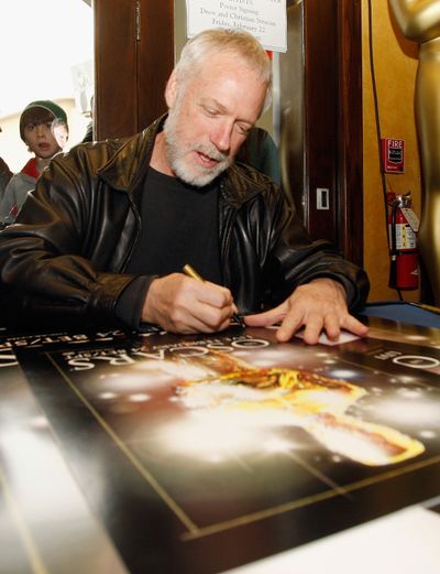 Artist Drew Struzan signs copies of the Academy Awards poster at the Hollywood & Highland Center on Feb. 22, 2008, in Los Angeles.  (Mark Mainz/Getty Images North America/TNS)