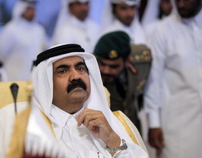 Emir of Qatar Sheikh Hamad Bin Khalifa Al Thani chairs his country’s delegation  Monday at the Arab League Summit.  (Associated Press / The Spokesman-Review)
