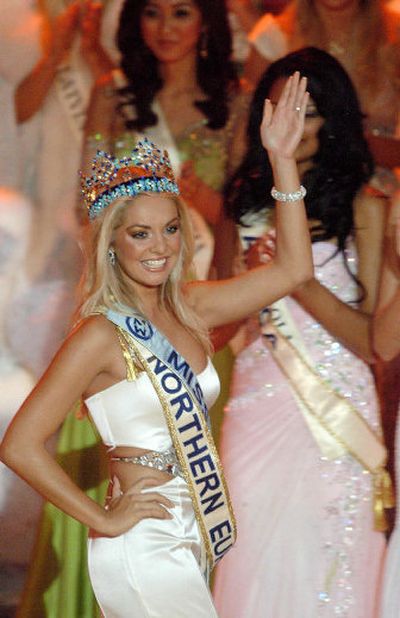 
Miss Czech Republic Tatana Kucharova waves after being crowned Miss World 2006. 
 (Associated Press / The Spokesman-Review)