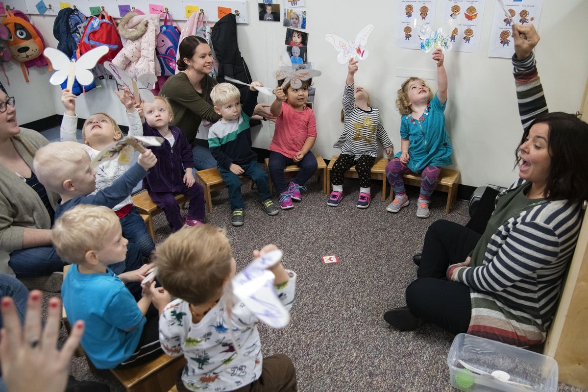 Speech language pathologist Ashley Potter sings a song about butterflies during circle time with 2-year-olds Wednesday  at the Spokane Guilds’ School. When Deer Park resident Beryl Baker died he $1 million and his expansive ranch in Stevens County for future generations. His  philanthropy will benefit the Spokane Guilds’ School, the Green House Community Center and graduates of Deer Park High School. (Colin Mulvany / The Spokesman-Review)