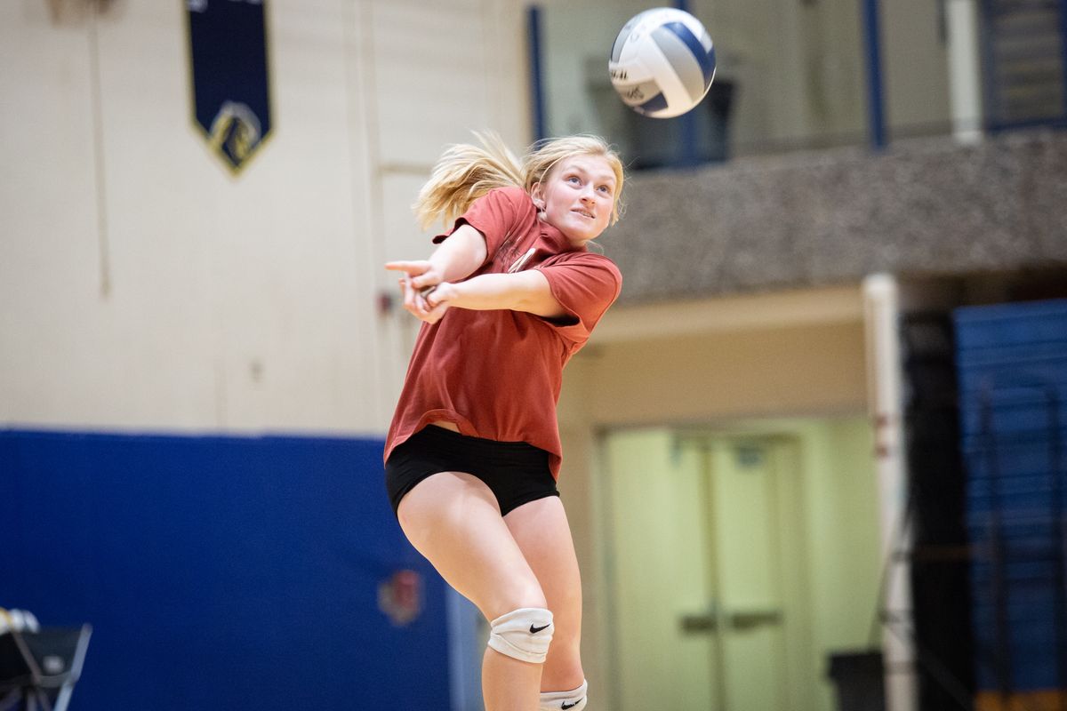 Senior Allie Flynn receives the ball during a Mead High School volleyball practice on Tuesday, Oct. 7, 2019 at Mead High School.  (Libby Kamrowski / The Spokesman-Review)