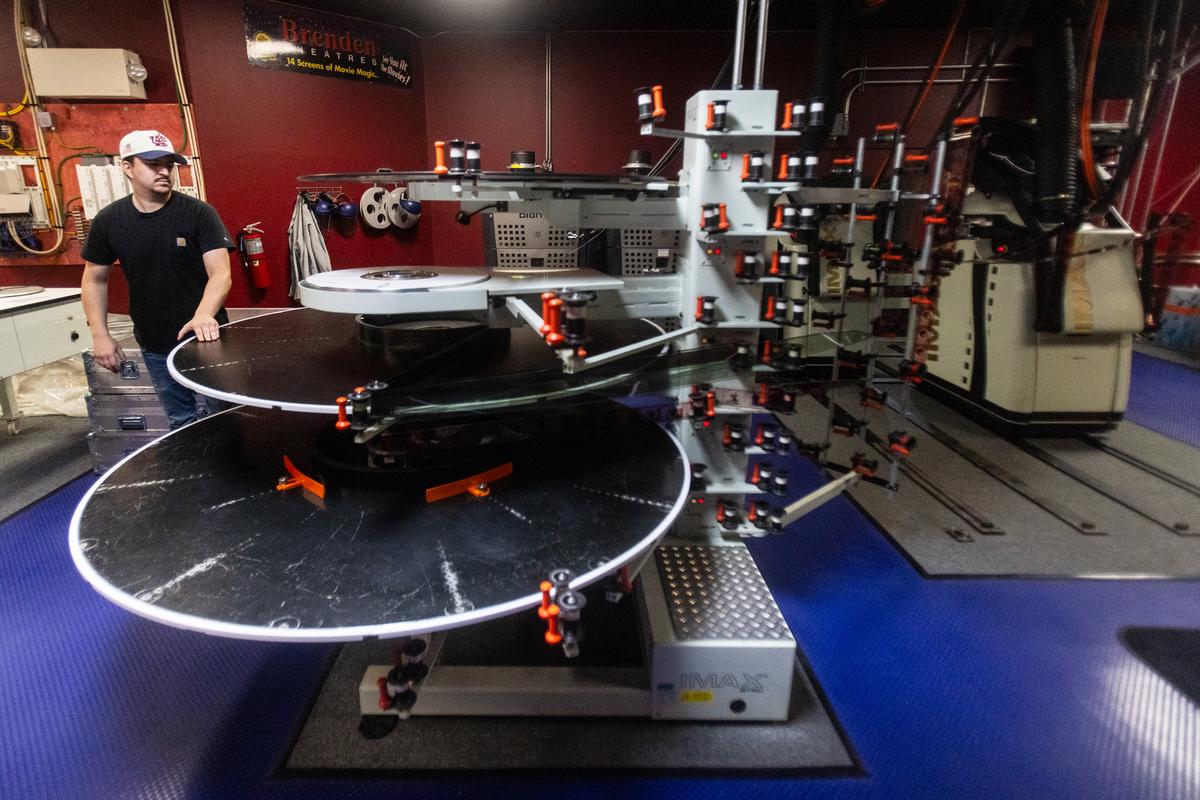Shane Kaiser, a region technician at Brenden Theaters, "threads up" film for an IMAX projector at Brenden Theaters on Wednesday, July 8, 2026, at the Palms Casino Resort in Las Vegas.   (Marley Barboeisel/Las Vegas Review-Journal/TNS)