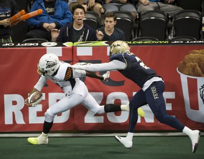 Empire wide receiver Carl Sims, left, ranks third in Indoor Football League career receiving yards with 4,468. (Colin Mulvany / The Spokesman-Review)