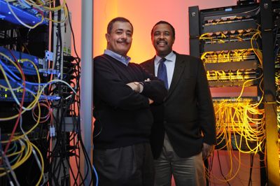 Milo Medin, left, and John Muleta, co-founders of M2Z Networks, pose for a photo among the company’s servers in Arlington, Va.  (Associated Press / The Spokesman-Review)