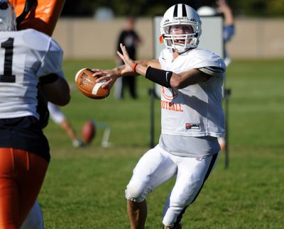 West Valley quarterback Drew Clausen looks for a receiver at practice Tuesday. He is a double threat to pass or run and is the key for the Eagles bid to win the Great Northern League title. (J. BART RAYNIAK / The Spokesman-Review)