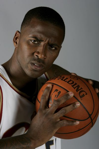 FILE - In this Sept. 29, 2008, file photo, Cleveland Cavaliers' Lorenzen Wright poses at the NBA basketball team's media day in Independence, Ohio. Authorities say a man has been charged in the 2010 slaying of former NBA player Lorenzen Wright. (Mark Duncan / Associated Press)