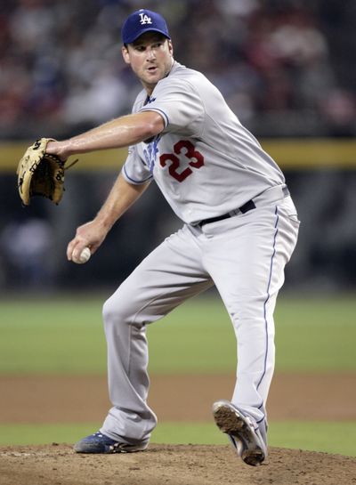Derek Lowe will earn $60 million over four years if he passes a physical. (Associated Press / The Spokesman-Review)