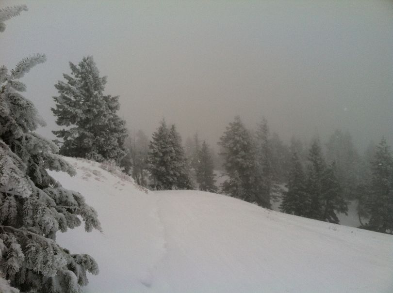 Fog drifts in and out at Bogus Basin Ski Resort on Sunday, as the resort opened the backside of the mountain for the first time this season (Betsy Russell)