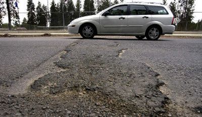 
This pavement patch is on Eighth Avenue just west of Park Road in Spokane Valley.
 (Liz Kishimoto / The Spokesman-Review)