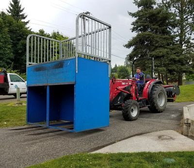 A worker moves part of one of the jumps during demolition of the Coeur d'Alene Skate Park, behind Memorial Field. The city is setting up a temporary Skate Park near Sunset Park in the 1300 block of Best Ave. (City of Coeur d'Alene photo)