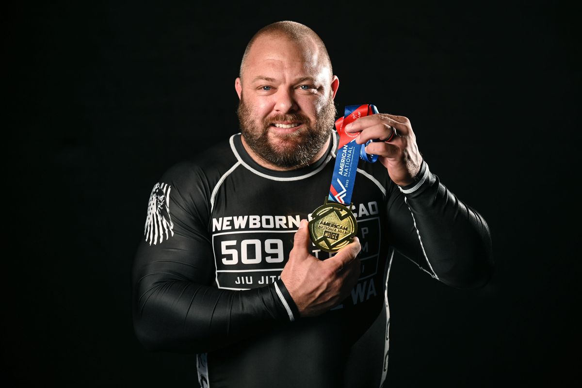 Kasey Eslick, 40, a Central Valley alum, recently won a championship belt at the International Brazilian Jiu-Jitsu Federation Nationals in Las Vegas in the heavyweight class.  (Dan Pelle/The Spokesman-Review)