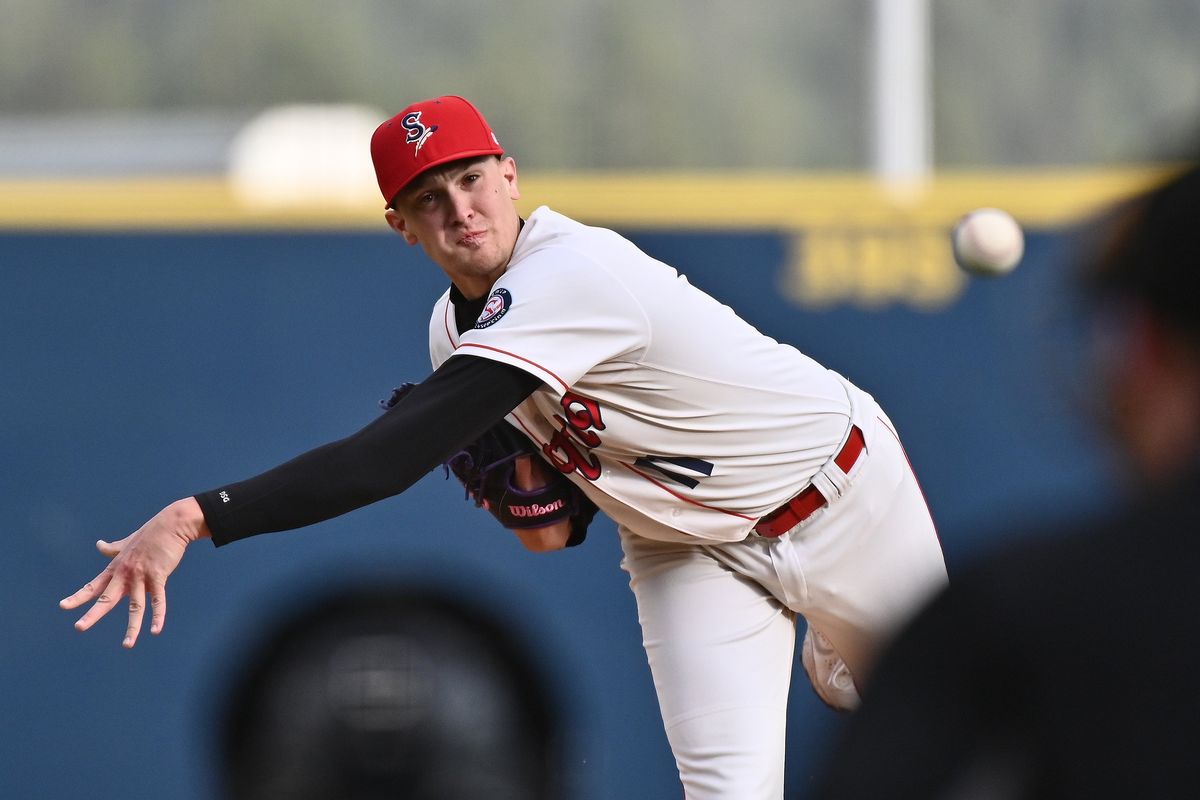 Spokane Indians pitcher Joe Rock (11) throws a pitch during a Northwest League baseball game against the Vancouver Canadians at Avista Stadium on Sat, April. 9, 2022 in Spokane WA.   (James Snook/For The Spokesman-Review)