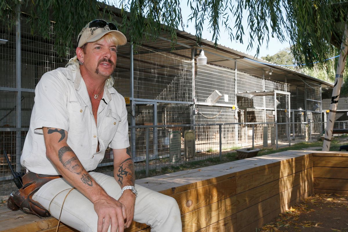 FILE - In this Aug. 28, 2013, file photo, Joseph Maldonado-Passage, also known as Joe Exotic, is seen at the zoo he used to run in Wynnewood, Okla. The former zookeeper has been transferred to a medical facility in North Carolina for federal inmates after a cancer diagnosis, according to his attorney.  (Sue Ogrocki)