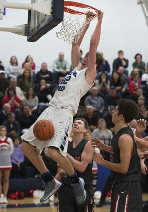 Gonzaga Prep's Shane Eugenio dunks the ball against Ferris during the first half of boy's GSL high school basketball game, Friday, Jan. 8, 2016, at Gonzaga Preparatory School. (Colin Mulvany / The Spokesman-Review)