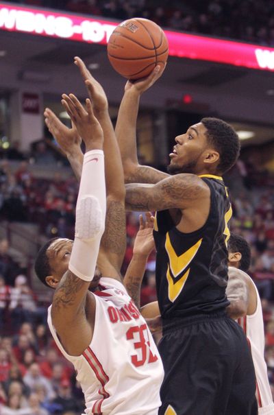Iowa’s Roy Devyn Marble scored 22 points in win. (Associated Press)