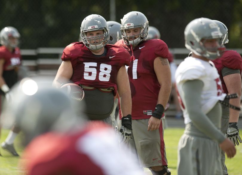 WSU offensive lineman Riley Sorenson (58) is thankful football gives him respite from death of his father and worries over health of his mother. (Tyler Tjomsland / The Spokesman-Review)