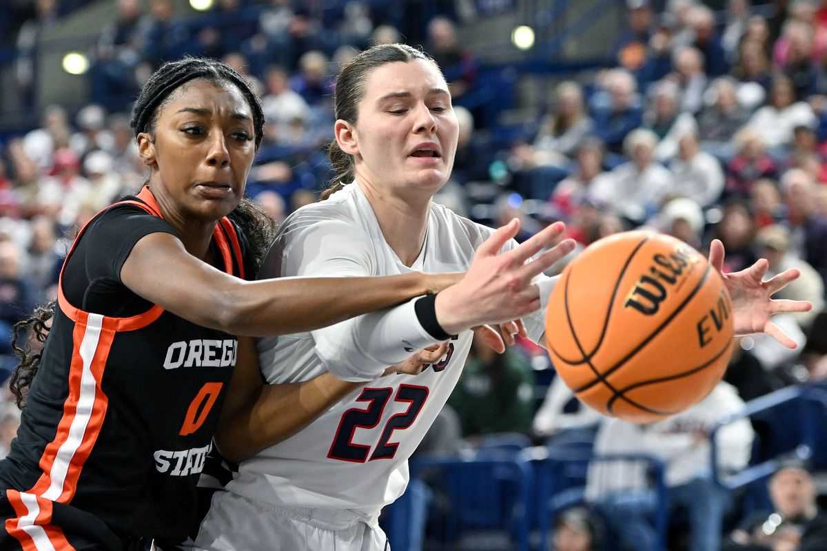 Gonzaga forward McKynnlie Dalan fights for the ball against Oregon State’s Tiara Bolden during the second half of Saturday’s game at McCarthey Athletic Center.  (James Snook)