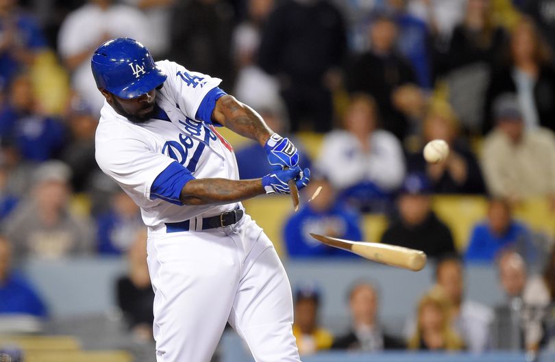 Los Angeles Dodgers' Howie Kendrick hits a broken bat single in the ninth inning to beat the Mariners. (AP)