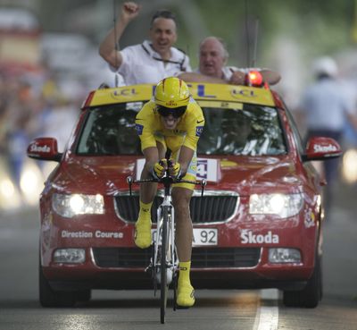 Spain’s Alberto Contador crosses the finish line Thursday while capturing the 18th stage of the Tour de France.  (Associated Press / The Spokesman-Review)