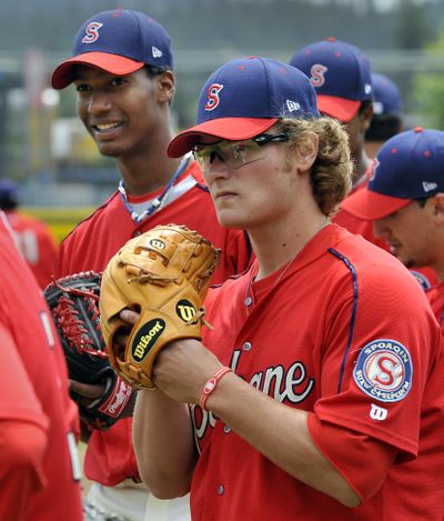Matt West, foreground, and David Perez, are hard-throwing pitchers for the Spokane Indians, who open the season Friday at Avista Stadium. (Dan Pelle)