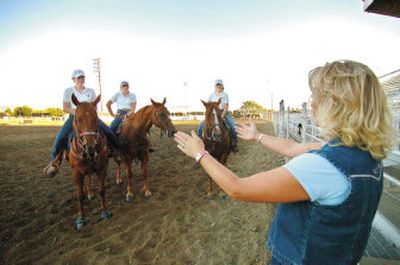 
Angie Brown provides instructions to this year's fair royalty in the rodeo arena at the Walla Walla County Fairgrounds. 
 (Associated Press / The Spokesman-Review)