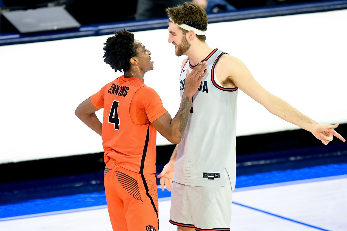 Gonzaga forward Drew Timme enjoys a chat with Pacific guard Daniss Jenkins after the Zags’ win on Jan. 23. Both were prep standouts in the Dallas area.  (By Tyler Tjomsland / The Spokesman-Review)