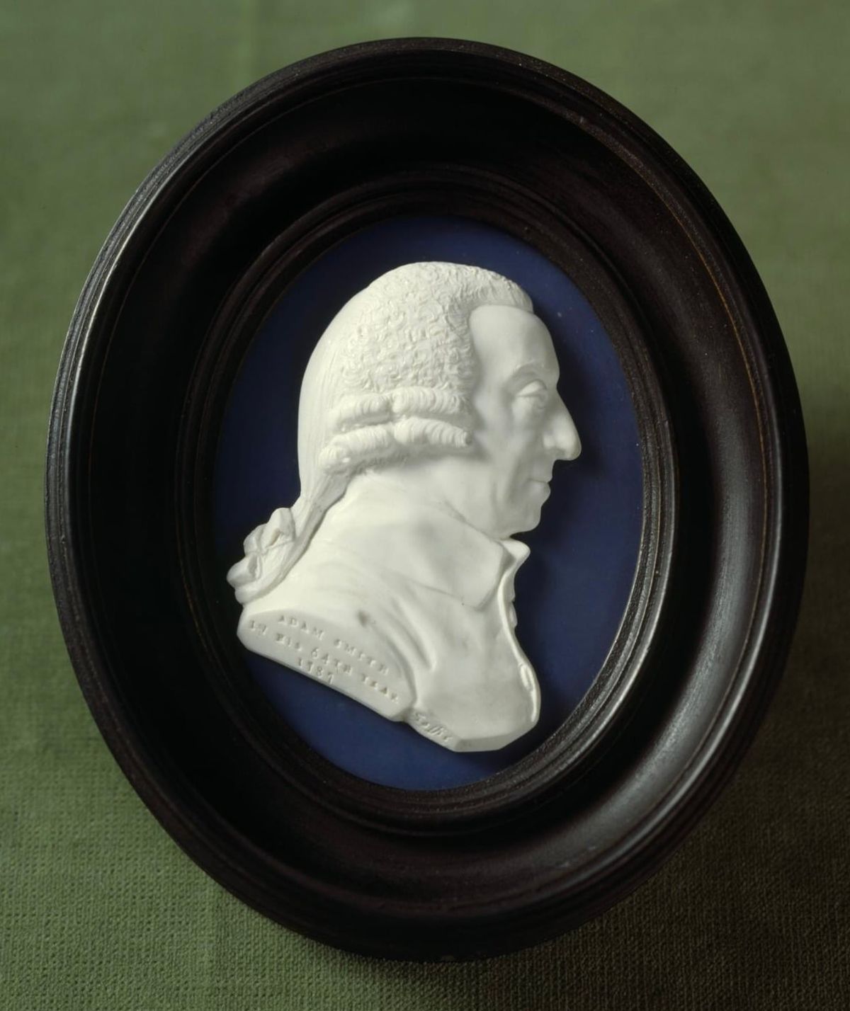 This portrait medallian of Adam Smith is one of two created in 1787 by artist James Tassie. According to a friend, Smith “never sat for his picture,” but some think he may have sat for Tassie’s work.  (Courtesy of National Galleries of Scotland)