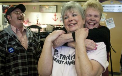 During her retirement party Friday, Rogers High  cook Cheryl Steward receives a hug from  Jan Mellon. Steward has worked as a baker and cook for Spokane Public Schools for 30 years.  (Colin Mulvany / The Spokesman-Review)